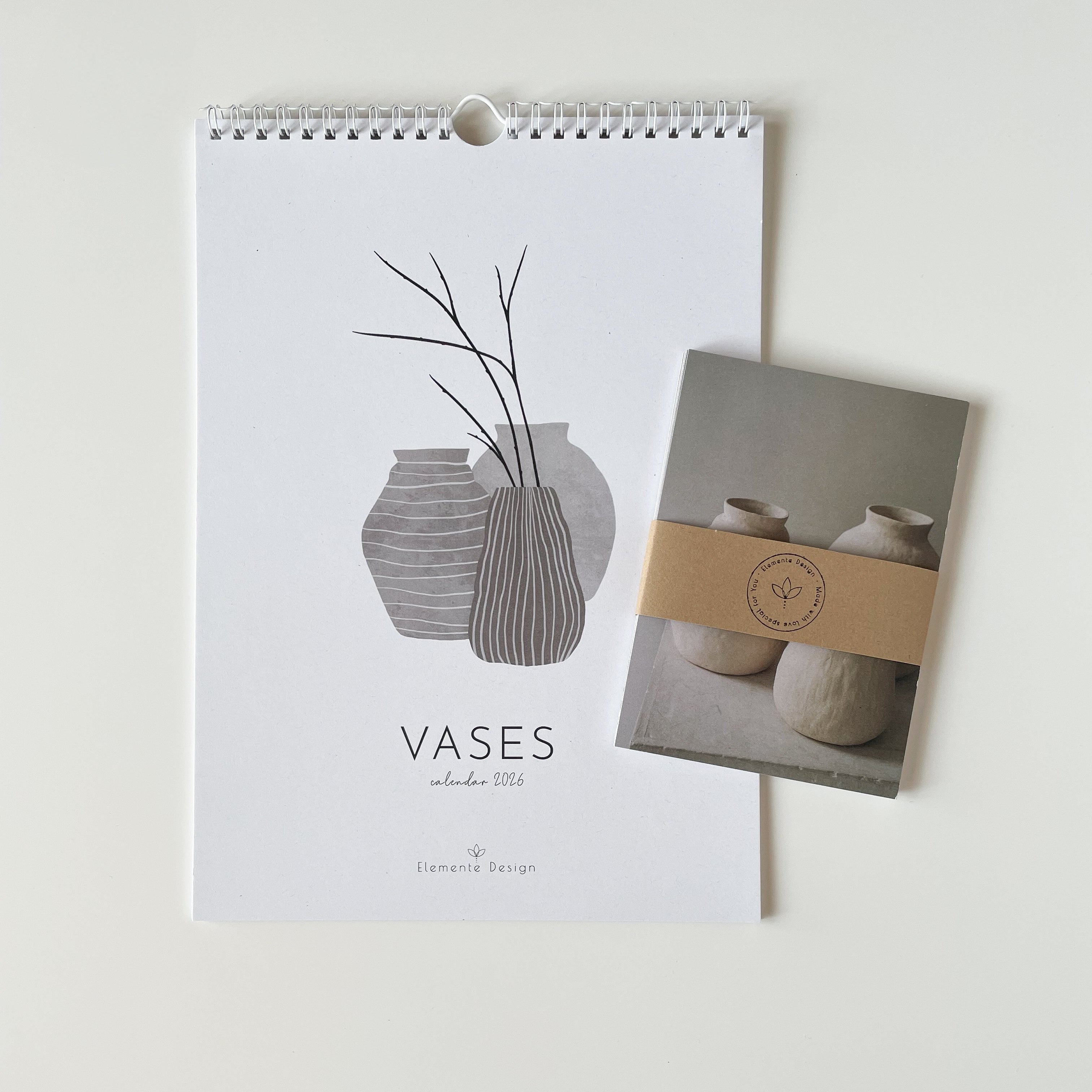 Calendar with vase design and a set of postcards on a light background